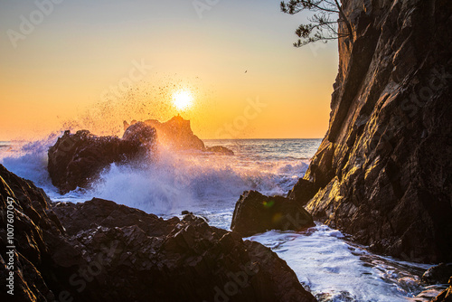 Morning view of waves on the beach rocks at Gyeongju-si, South Korea photo