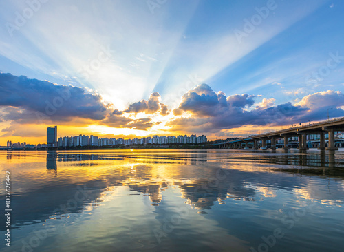 Sunset view of Han River with Techno Mart and Cheonho Bridge near Gwangjin-gu, Seoul, South Korea photo