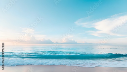 Tranquil ocean waves caressing the shoreline under a serene blue sky dotted with fluffy clouds