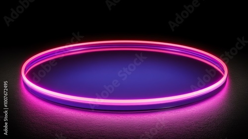 Glowing pink and purple neon circle on black background.