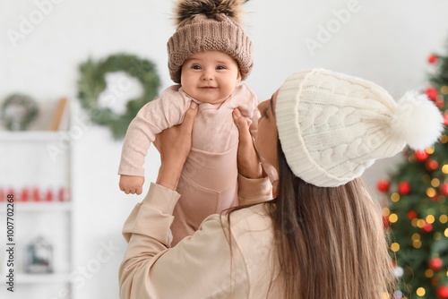 Happy mother with her littl...
