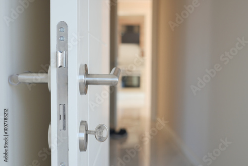 open door concept with Door handle and blur interior room background,