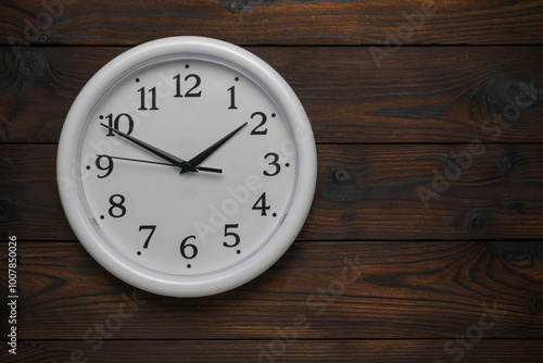 Wallpaper Mural Simple White Wall Clock on Dark Wooden Background Showing Time Torontodigital.ca