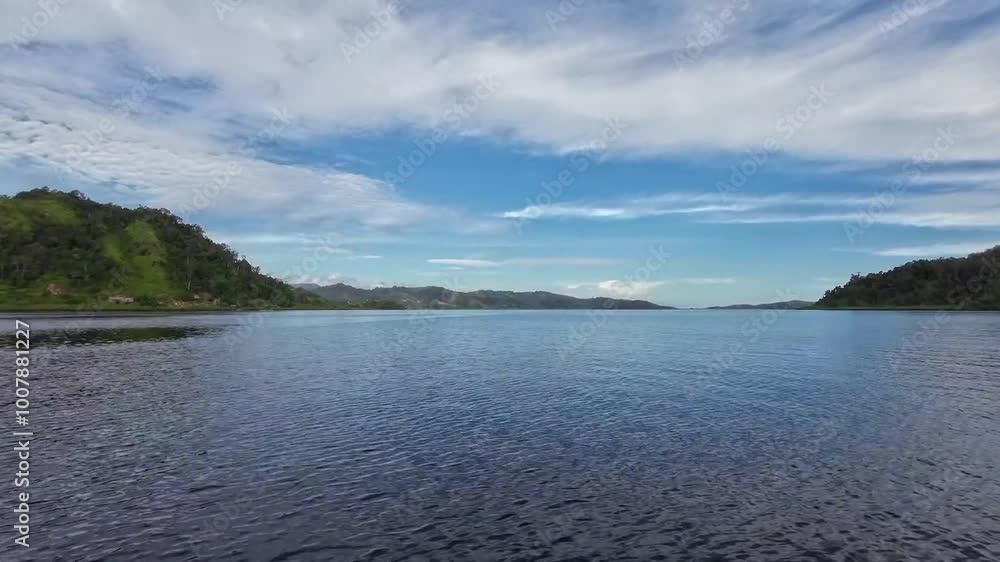 beatiful view sea, islands and hills. Blue Cloudy sky. The Footage moves sideways scene. Mandeh, West Sumatra, Indonesia beatiful view sea, islands and hills. Blue Cloudy sky. The Footage moves sideways scene. Mandeh, West Sumatra, Indonesia