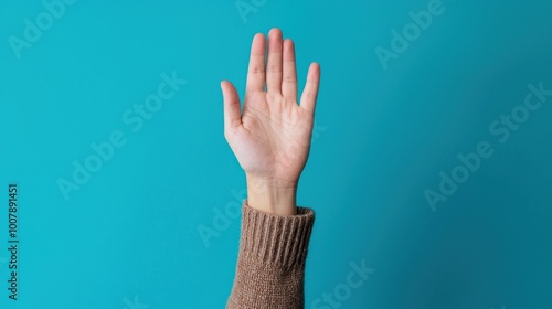 Solemn Vow of Commitment: Person Making Serious Promise with Raised Hand and Determined Expression