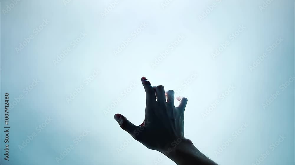 A hand reaching out through mist or fog, conveying a sense of longing or searching. A hand reaching out through mist or fog, conveying a sense of longing or searching.