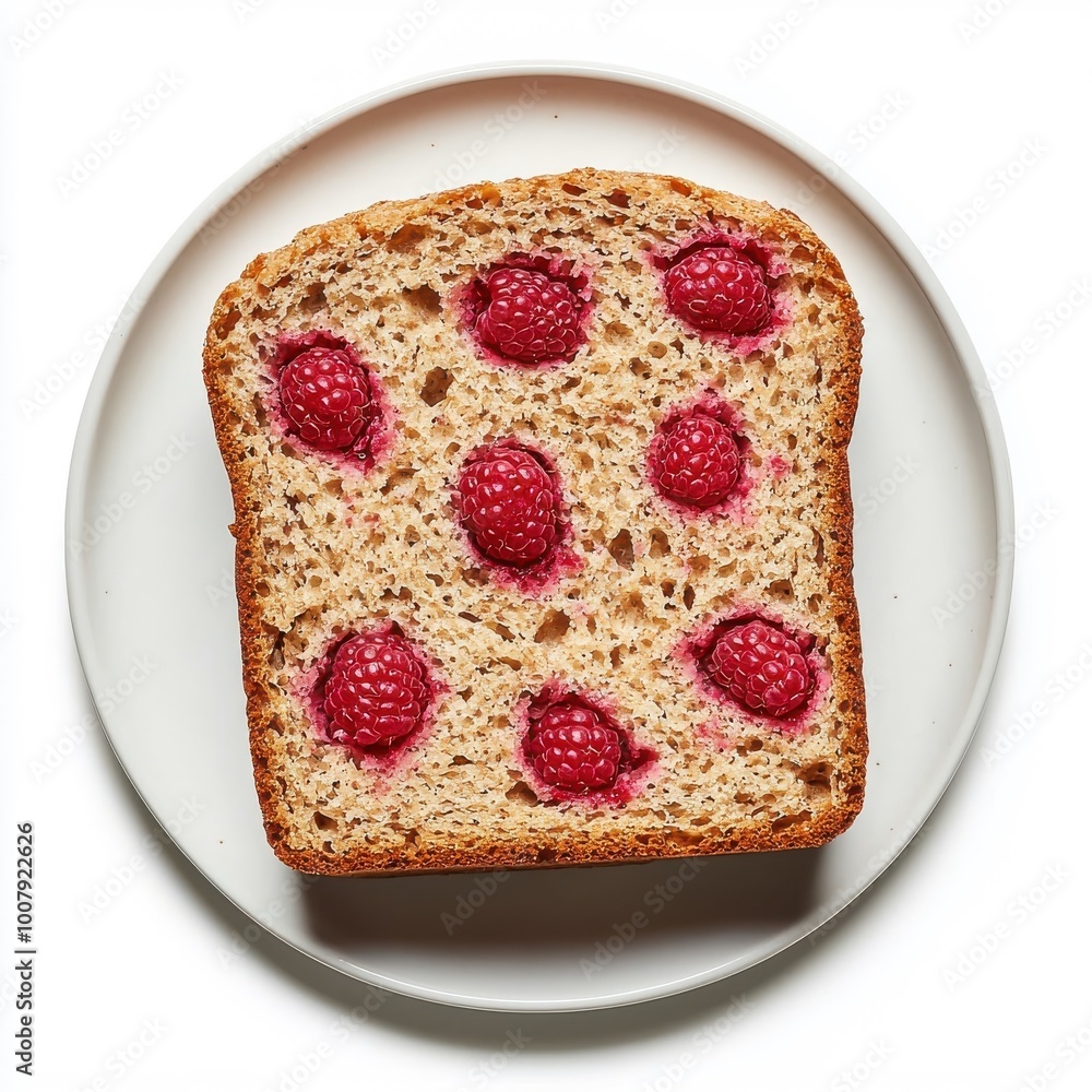 Whole wheat raspberry bread on a white plate, isolated on a white background, showcasing its combination of hearty grains and tangy raspberries. Whole wheat raspberry bread on a white plate, isolated on a white background, showcasing its combination of hearty grains and tangy raspberries.