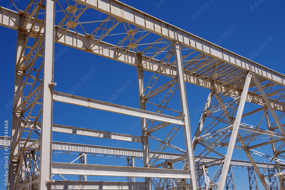 Cranes and huge metal structures at an old defunct shipyard Cranes and huge metal structures at an old defunct shipyard
