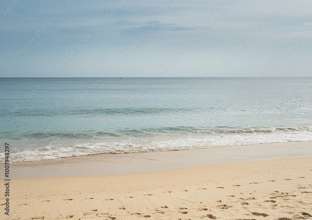 A pristine beach with golden sand leading up to the azure waters A pristine beach with golden sand leading up to the azure waters