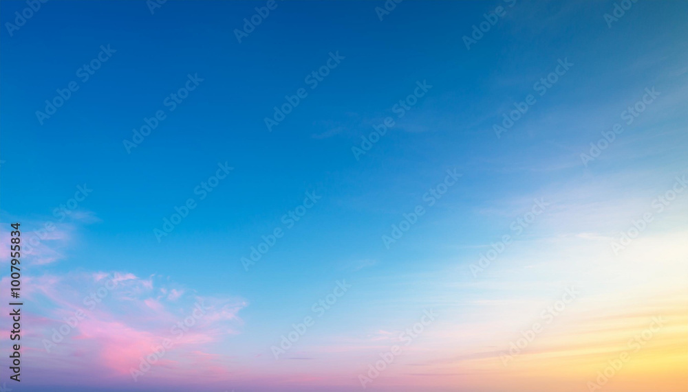 Obraz premium A breathtaking sunset sky with vibrant colors and soft clouds, creating a peaceful and serene atmosphere