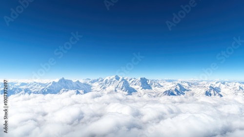 Panoramic View of Snow-Capped Mountains Under Clear Sky