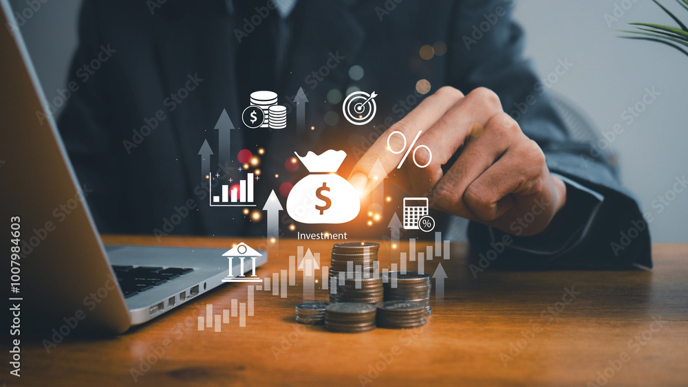 © ภาคภูมิ ปัจจังคะตา - finance and investment concept, invest money, fundraising, ROI return on investment, Interest rate and dividend concept, Businessman is calculating income and return on investment in percentage. © ภาคภูมิ ปัจจังคะตา - finance and investment concept, invest money, fundraising, ROI return on investment, Interest rate and dividend concept, Businessman is calculating income and return on investment in percentage.