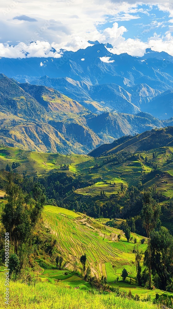 Breathtaking landscape showcasing lush green hills and majestic mountains under a bright blue sky. Breathtaking landscape showcasing lush green hills and majestic mountains under a bright blue sky.