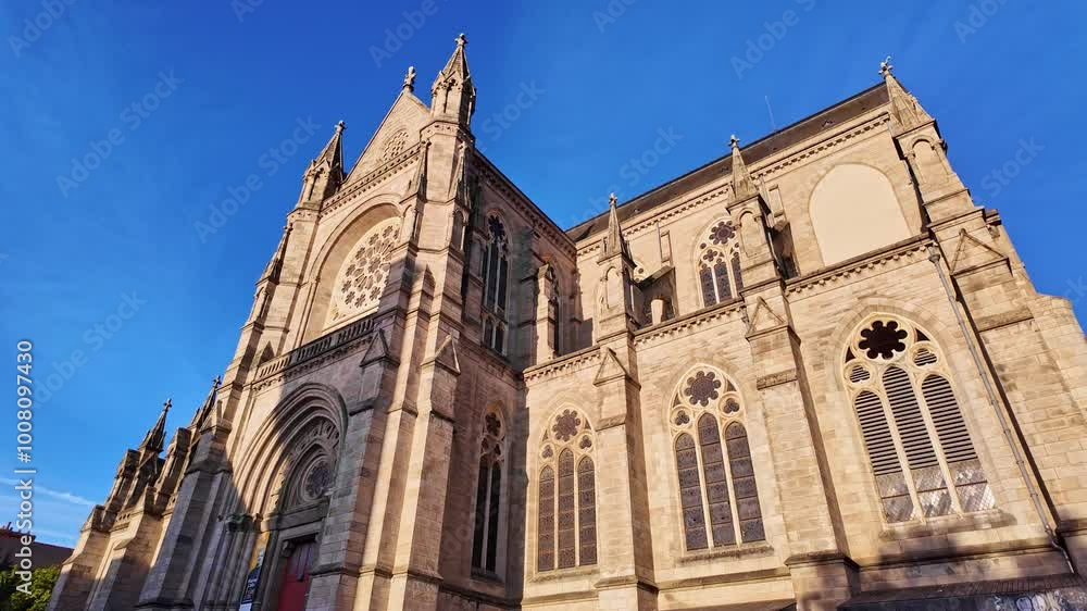 Low angle view about the catholic basilica Sainte-Anne in sunny day, Rennes, Bretagne, France. Low angle view about the catholic basilica Sainte-Anne in sunny day, Rennes, Bretagne, France.