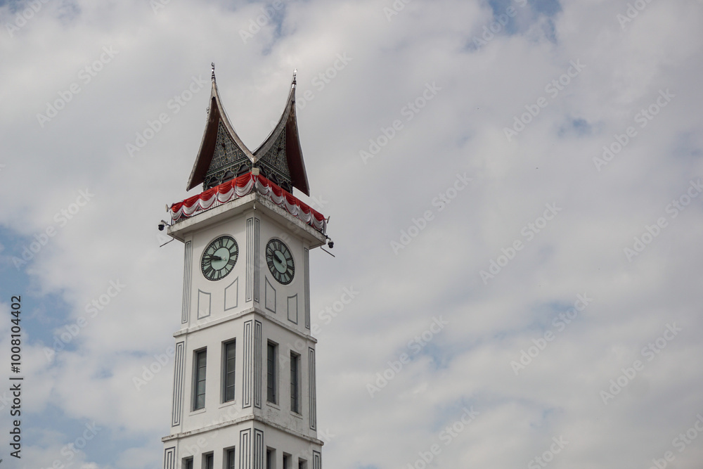 A popular big clock tower in Bukittinggi called Jam Gadang. Historical building in west sumatera A popular big clock tower in Bukittinggi called Jam Gadang. Historical building in west sumatera