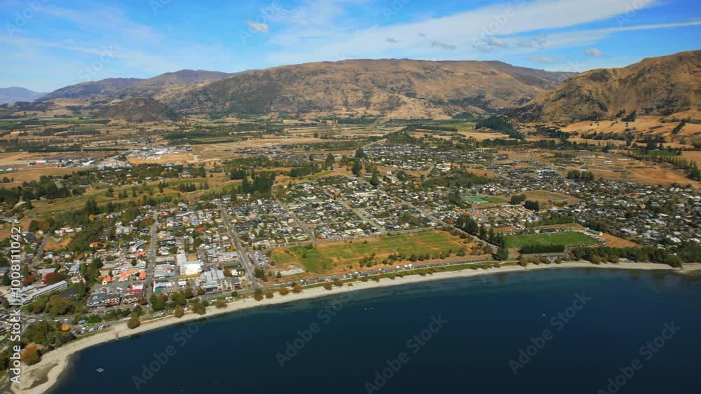 Wānaka town on the shores of Lake Wanaka was originally called Pembroke on the South Island of New Zealand - push in aerial Wānaka town on the shores of Lake Wanaka was originally called Pembroke on the South Island of New Zealand - push in aerial