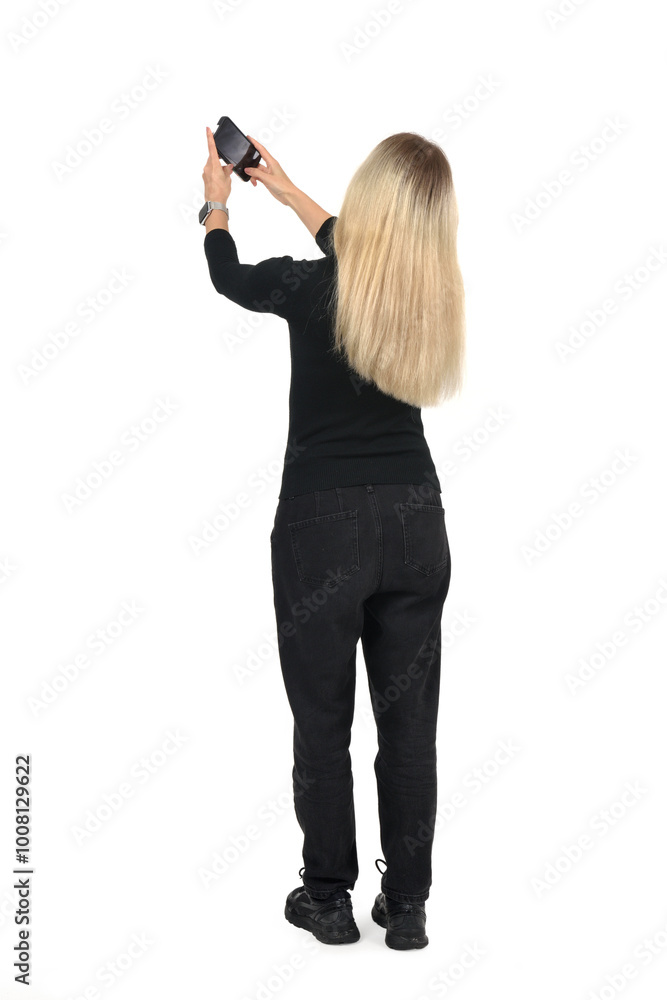 back view of a woman taking a selfie on white background back view of a woman taking a selfie on white background