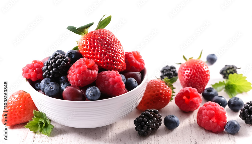 Mixed berries, strawberries, blueberries and blackberries in a bowl on white background Mixed berries, strawberries, blueberries and blackberries in a bowl on white background