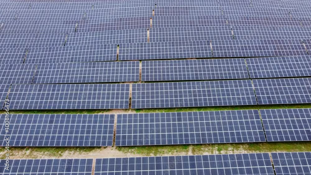 Infinite solar panels generating clean energy from sun, vast solar field, day Infinite solar panels generating clean energy from sun, vast solar field, day