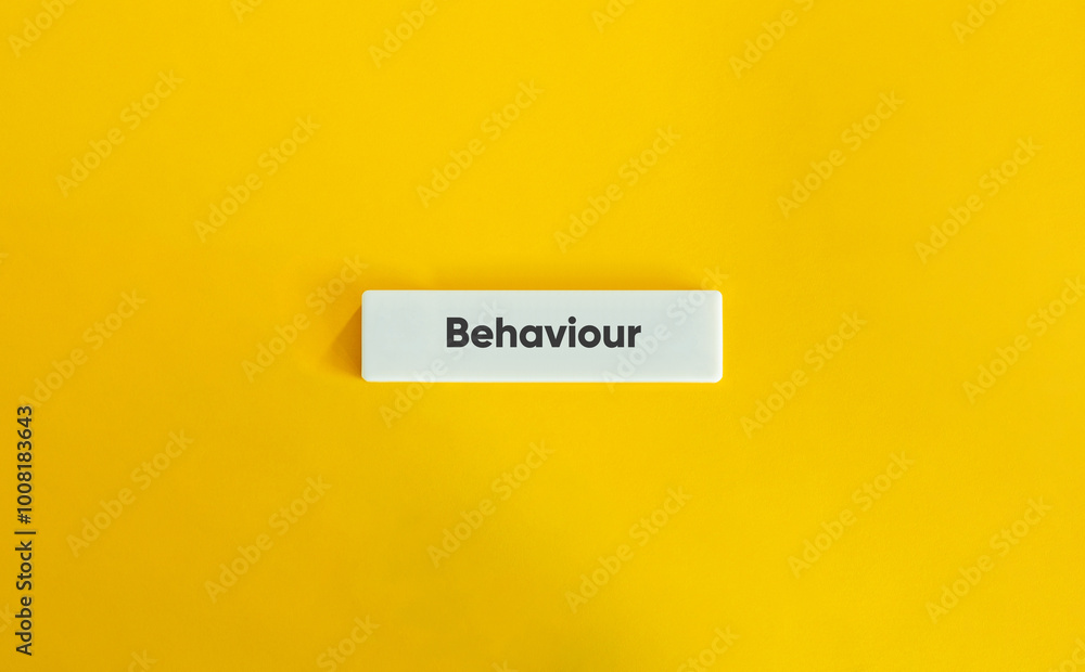 Behaviour Word and Banner. Text on Block Letter Tile on Yellow Background. Behaviour Word and Banner. Text on Block Letter Tile on Yellow Background.