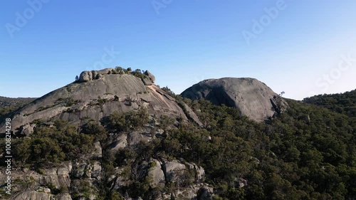 Left to right aerial Footage, the Pyramid, Girraween National Park, Southern Queensland Australia. Girraween National Park is located near Stanthorpe and the Queensland and New South Wales border. photo