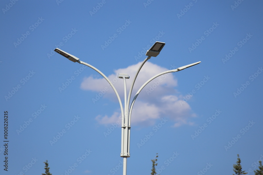 street lamp on blue and cloudy sky street lamp on blue and cloudy sky