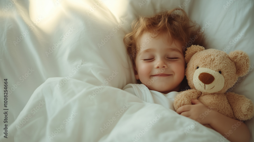 A young child is sleeping with a teddy bear A young child is sleeping with a teddy bear