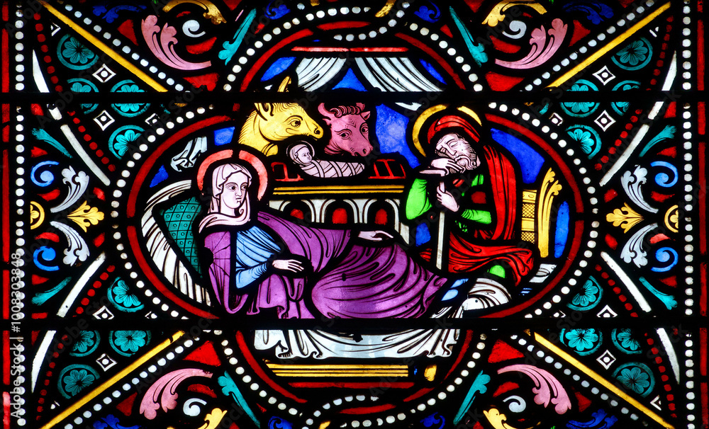 Obraz premium Stained glass (Nineteenth century) of Christmas Nativity Scene with Virgin Mary, Saint Joseph, and Jesus baby. .