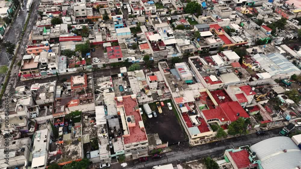 Soaring above rooftops of a low-income neighborhood in Ecatepec, Mexico Soaring above rooftops of a low-income neighborhood in Ecatepec, Mexico