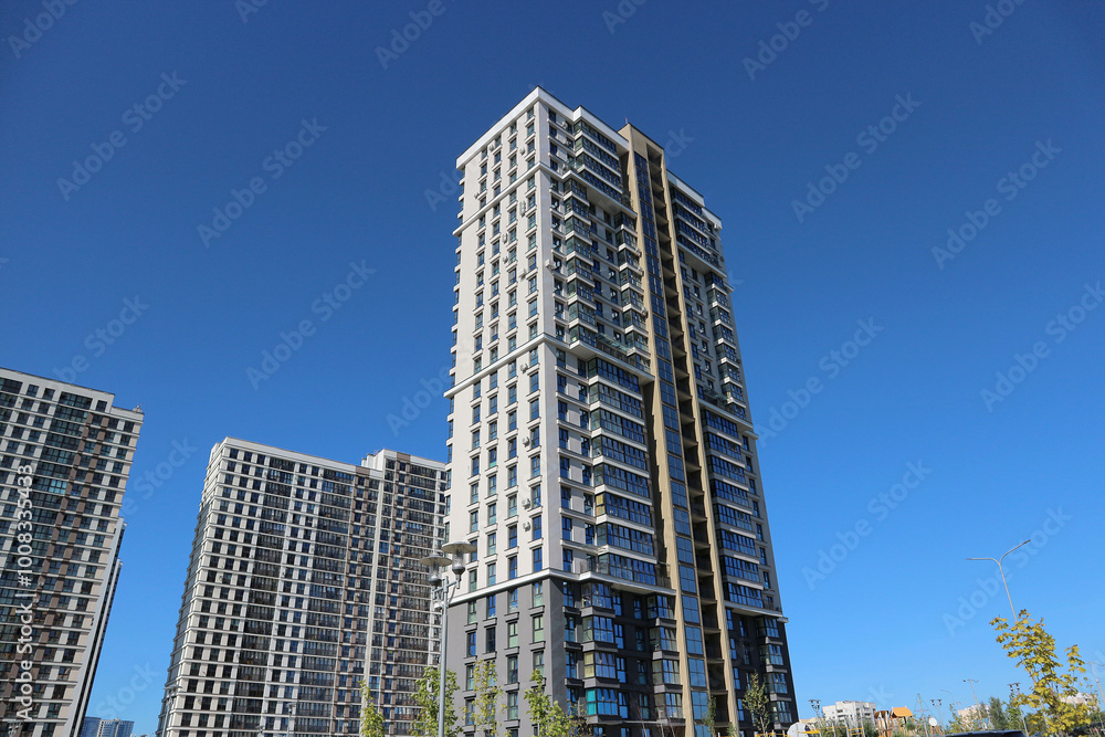Modern multi-storey high-rise buildings against the sky. Modern multi-storey high-rise buildings against the sky.