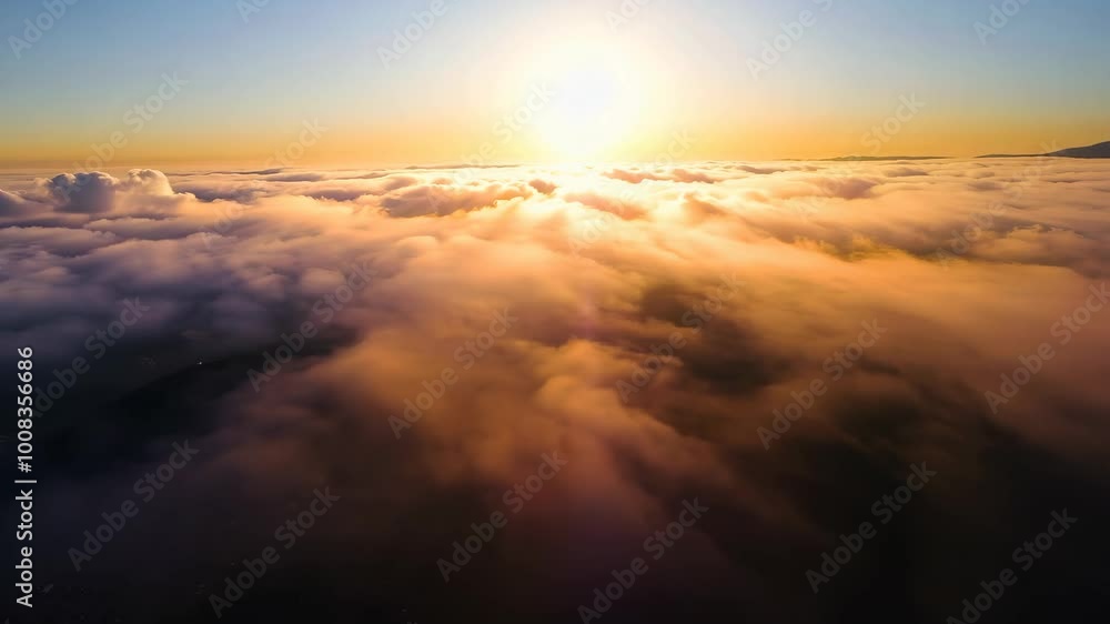 Stunning Aerial View of Sunset Clouds with Light Rays and Dreamy Atmosphere Stunning Aerial View of Sunset Clouds with Light Rays and Dreamy Atmosphere