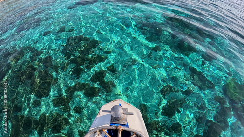 Azure clear water off the coast of the Gili Islands. Indonesian trimaran trip to popular islands in Indonesia photo