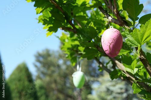 Easter egg tree decoration during easter spring holidays. Happy easter! Side view. Space for text.  photo