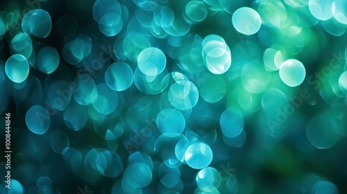 Cool blue-green bokeh, overlapping circular shapes with soft edges, created using macro photography, providing a serene backdrop with space for text.