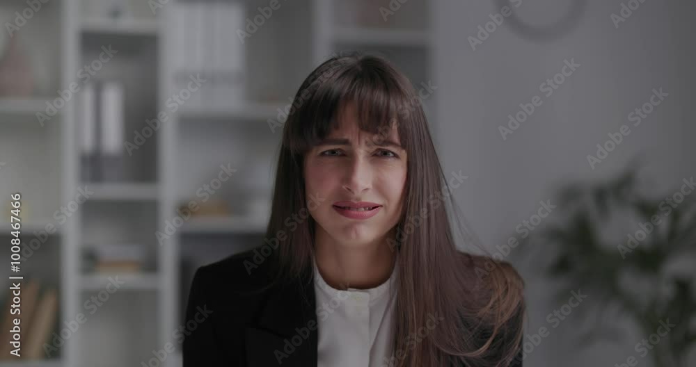 Screaming angry young businesswoman with a mental disorder, schizophrenia. Screaming angry young businesswoman with a mental disorder, schizophrenia.