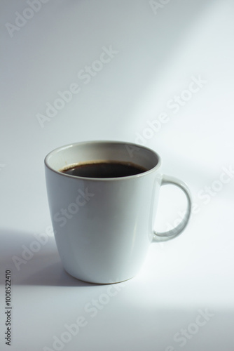 Cup of coffee on white  background. Close up.