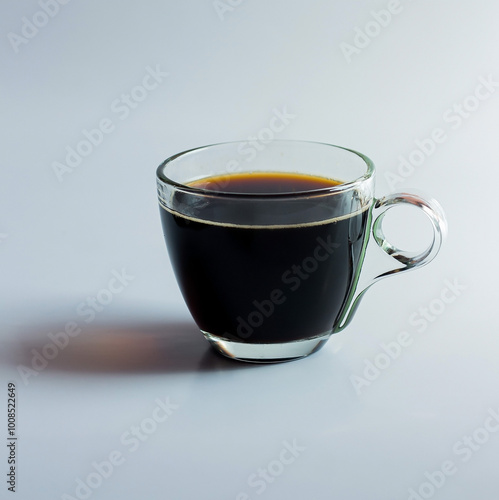 black drip coffee in glass cup  white background.