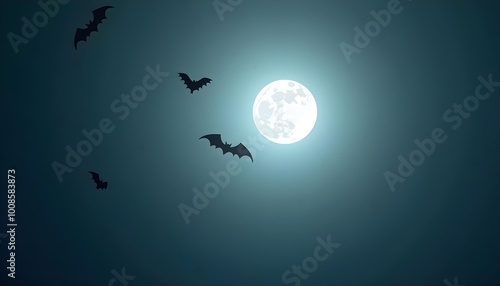 Bats soar through a night sky illuminated by a bright full moon