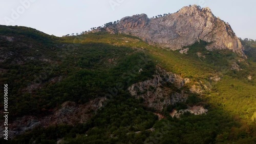 Serene Aerial View of Bosnia's Majestic Mountain Range at Dawn – Sunbeams and Clouds Over Lush Rainforest and Woodland in Herzegovina National Park | Scenic Nature, Wilderness, and Conservation Advent