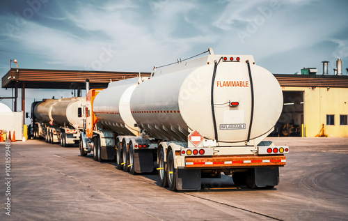 Flammable load. Gasoline transport truck with a full tank in the refinery