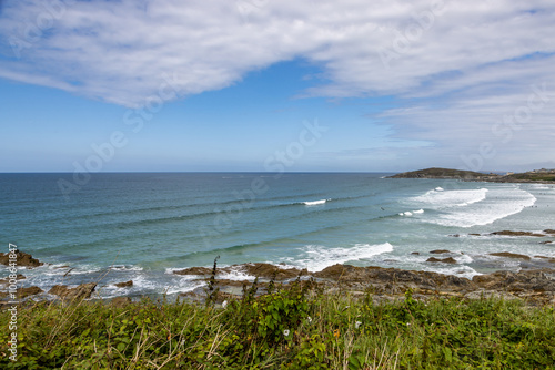 Looking out over Fistral Bay in Newquay, Cornwall, on a sunny August day