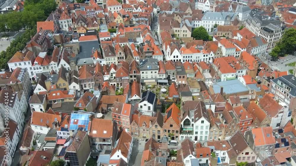 Aerial drone view of the streets in Brugge, Belgium. Colorful houses. Aerial drone view of the streets in Brugge, Belgium. Colorful houses.