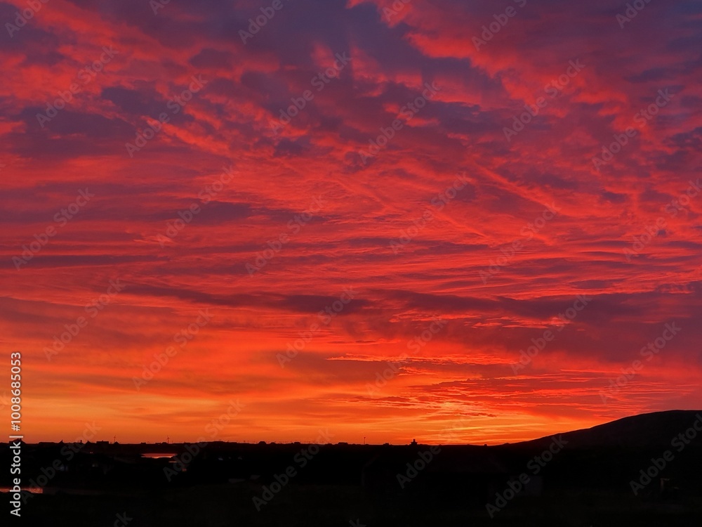 A fiery sunset sky in South Uist, Outer Hebrides, Scotland, UK A fiery sunset sky in South Uist, Outer Hebrides, Scotland, UK