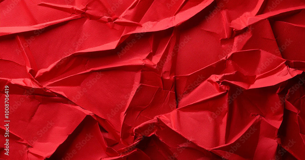 Red crumpled paper texture. Red crumpled paper texture.