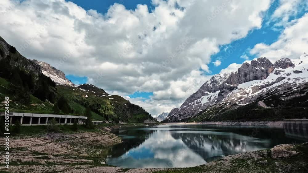4k Timelapse Of Clouds Moving Above Mountains And Lake With Reflection And Sunrays Over Lake In Dolomite Mountains In Northern Italy 4k Timelapse Of Clouds Moving Above Mountains And Lake With Reflection And Sunrays Over Lake In Dolomite Mountains In Northern Italy