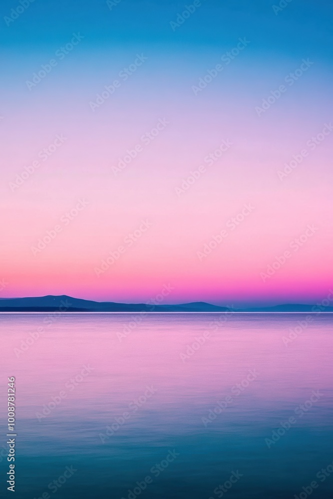 A tranquil sunset over a calm sea, showcasing vibrant shades of pink, purple, and blue that create a serene and picturesque atmosphere. A tranquil sunset over a calm sea, showcasing vibrant shades of pink, purple, and blue that create a serene and picturesque atmosphere.
