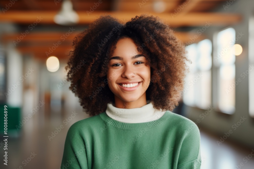 Smiling portrait of a young female college student Smiling portrait of a young female college student