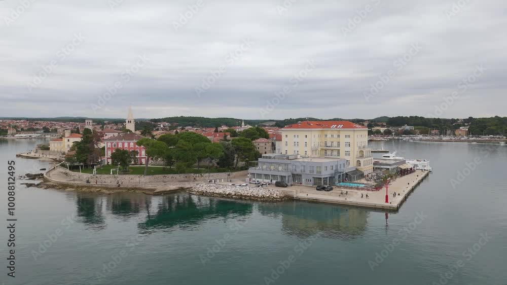Aerial drone video of the coastal town named Porec in Istria, Croatia.