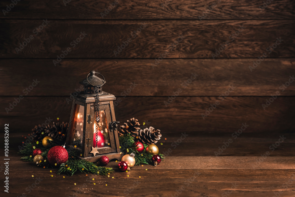 Merry Christmas! Merry Christmas and Happy New Year. Wooden lamps with candles, Christmas tinsel, fir branches and snow on a dark wooden background