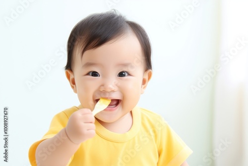 Baby eating biting food innocence.